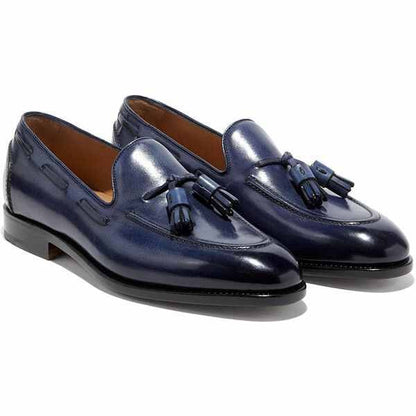 أحذية جلدية فاخرة مصنوعة يدوياً مزينة بشرابات